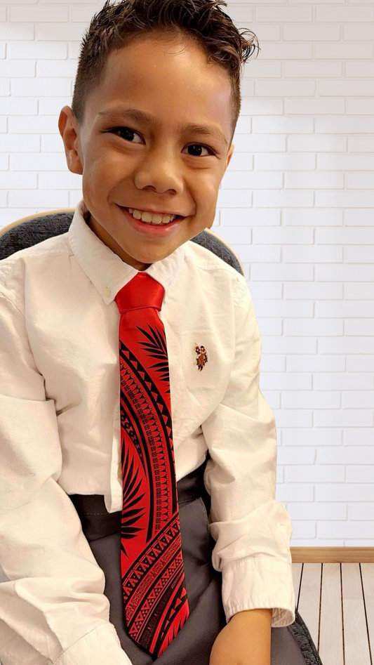 8 year old wearing the YOUTH red Maohi tie.